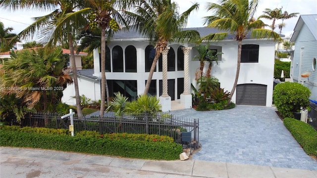 view of front of home with a garage