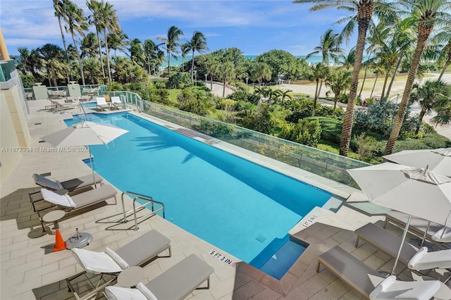 view of swimming pool featuring a patio