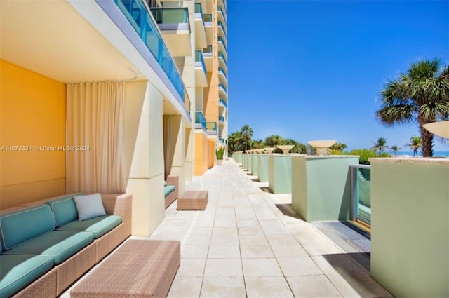 view of patio with a balcony