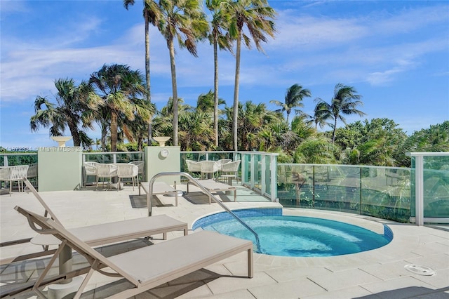 1455 Ocean Dr Unit 1203, Miami Beach, FL 33139 - view of swimming pool with a hot tub and a patio area