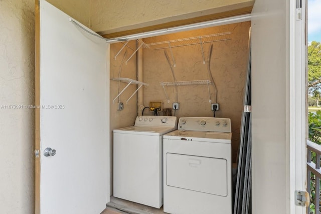 laundry area featuring washing machine and dryer