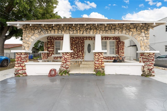 view of front facade featuring covered porch