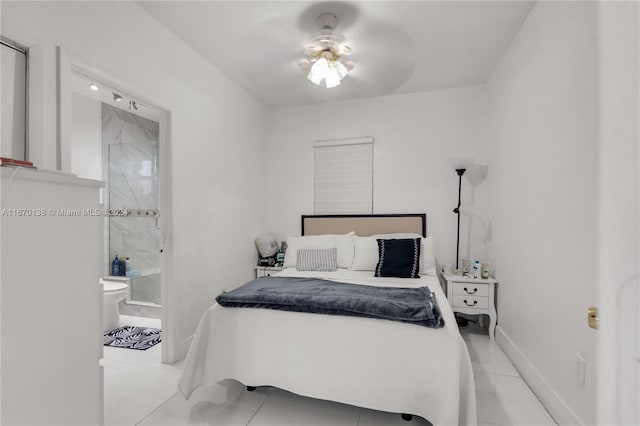 bedroom with ceiling fan, ensuite bath, and light tile patterned floors