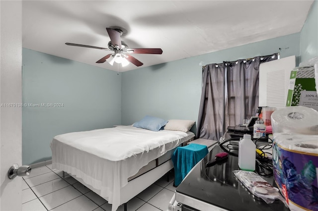 bedroom featuring ceiling fan and light tile patterned floors