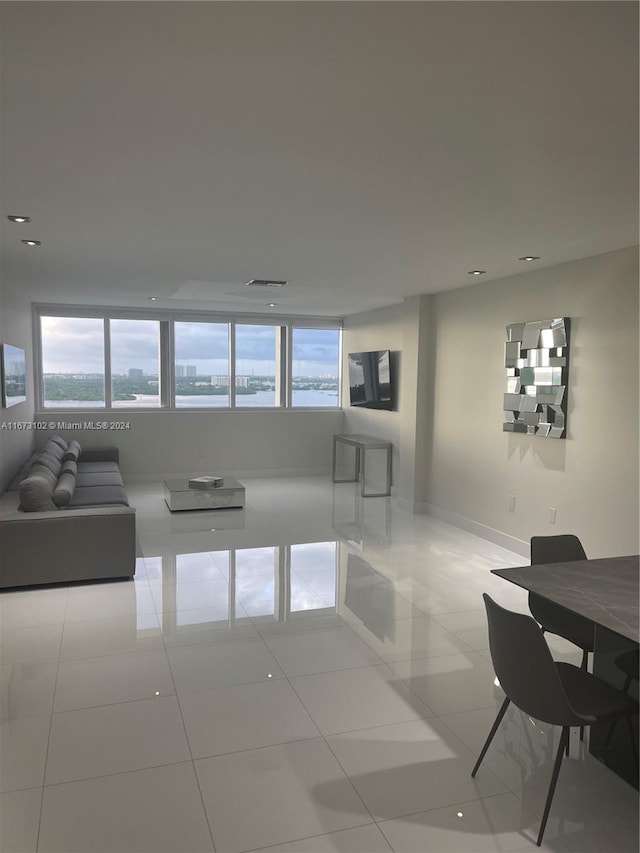 living room with light tile patterned floors