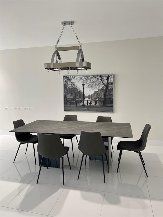 dining area with tile patterned floors