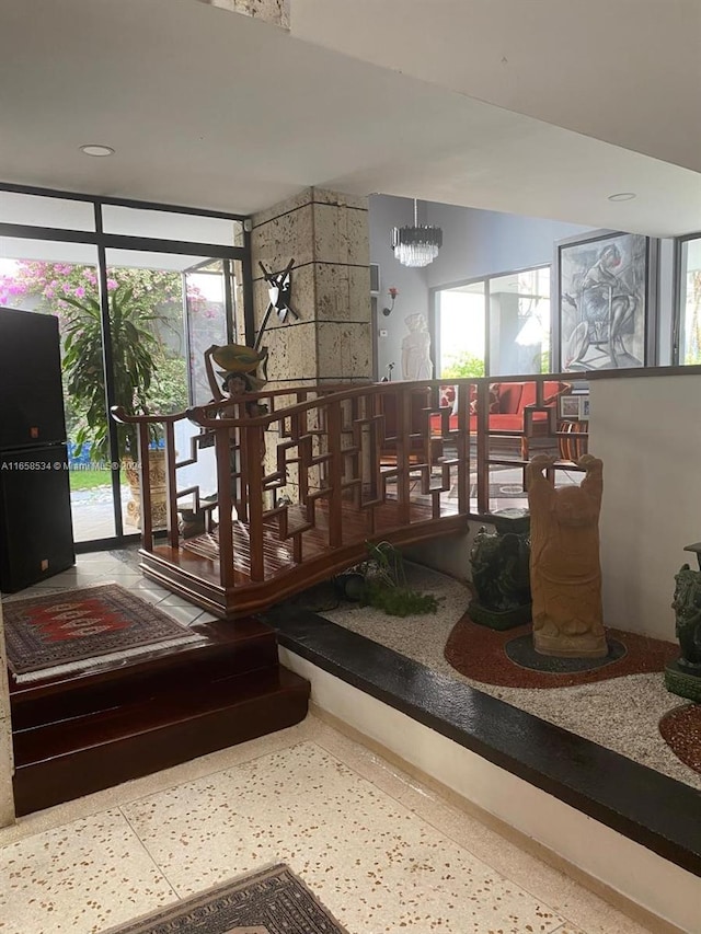 94-93 59 Cra, Barranquilla, FL 80001 - interior space with an inviting chandelier and speckled floor
