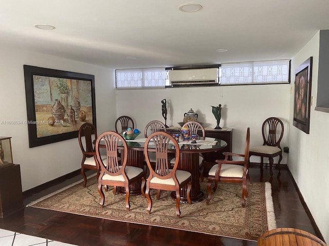 94-93 59 Cra, Barranquilla, FL 80001 - dining area featuring an AC wall unit, baseboards, and wood finished floors