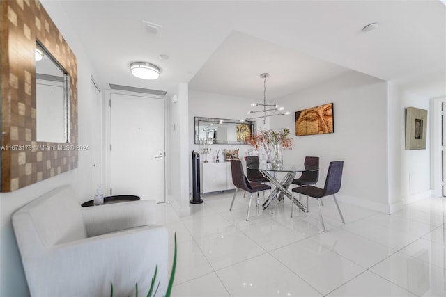 dining room featuring a notable chandelier