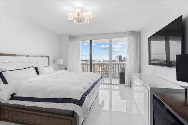 tiled bedroom with a notable chandelier and access to exterior