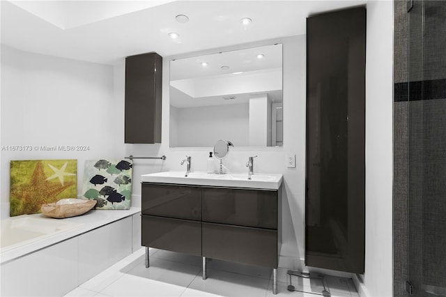 bathroom featuring vanity, tile patterned flooring, and an enclosed shower