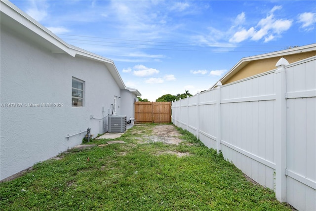 view of yard with central AC