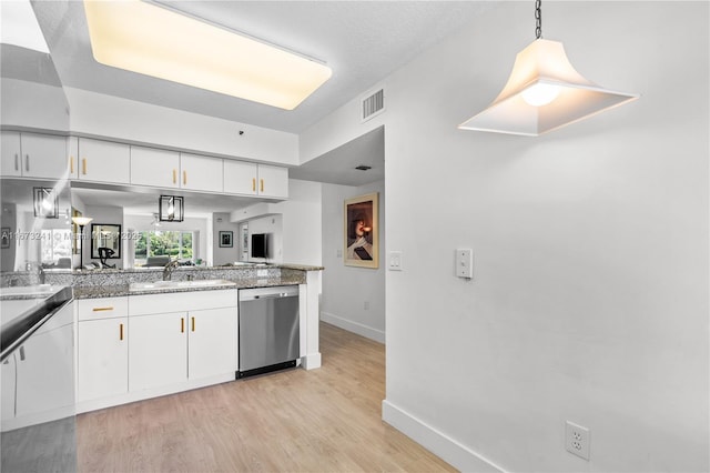 kitchen with dishwasher, sink, hanging light fixtures, light hardwood / wood-style flooring, and white cabinets