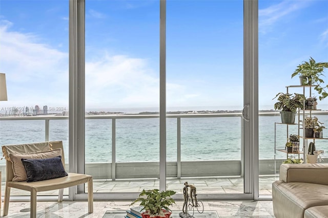 sunroom with a water view