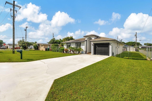 ranch-style home featuring a front yard and a garage