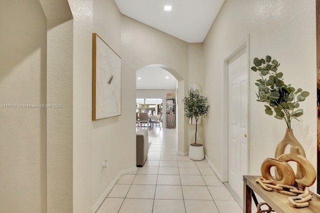 corridor with light tile patterned floors