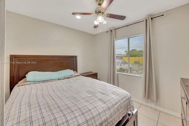 bedroom with light tile patterned flooring and ceiling fan