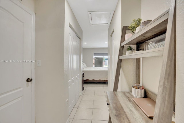 hallway with light tile patterned flooring