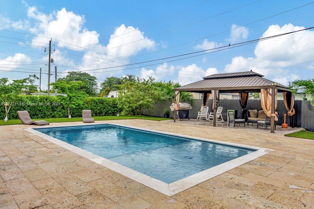 view of pool with a gazebo and a patio area