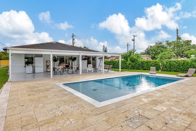 view of pool with a patio