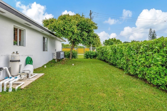 view of yard featuring central AC unit