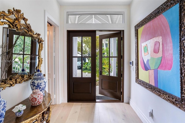 foyer entrance featuring light wood-type flooring