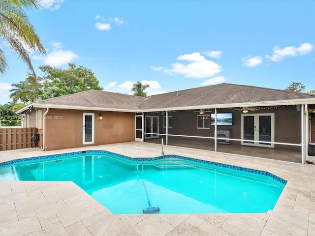 view of pool featuring french doors and a patio area