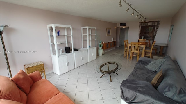 living room with light tile patterned flooring