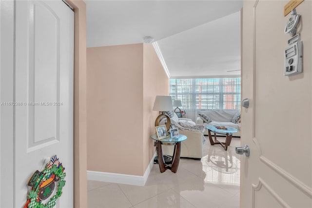 sitting room with light tile patterned floors