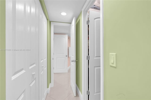 hallway with light tile patterned flooring