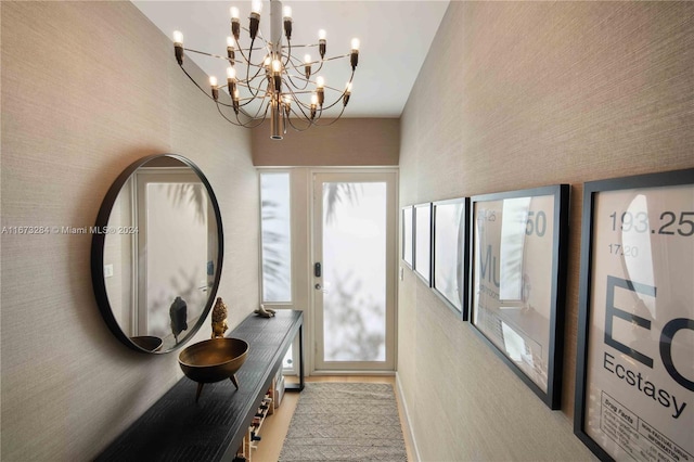 bedroom featuring ensuite bath and light hardwood / wood-style floors