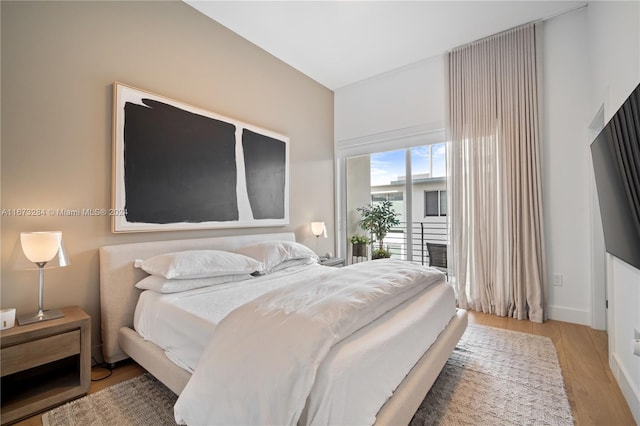 bedroom with light wood-type flooring