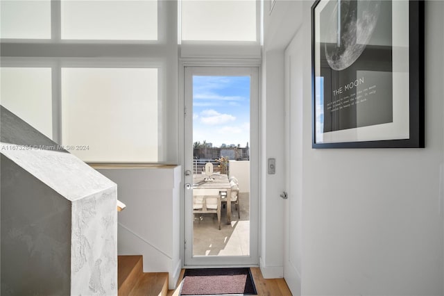 doorway to outside with hardwood / wood-style floors