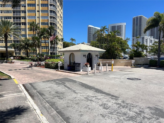 100 Golden Isles Dr Unit 605, Hallandale Beach, FL 33009 - view of building exterior with a city view