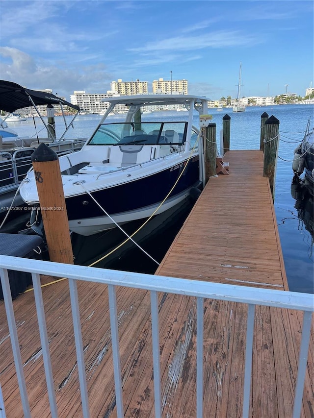 100 Golden Isles Dr Unit 605, Hallandale Beach, FL 33009 - view of dock featuring a water view