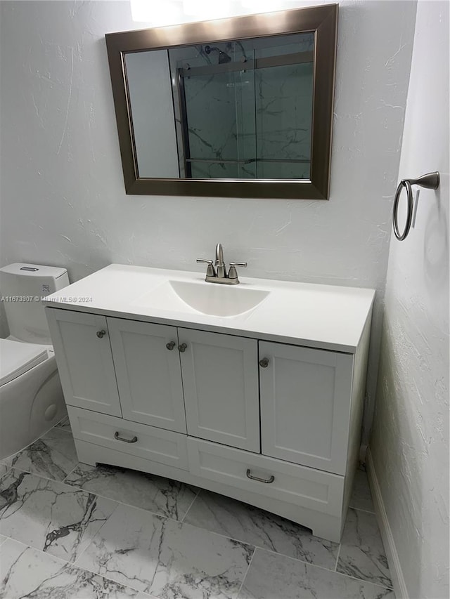 100 Golden Isles Dr Unit 605, Hallandale Beach, FL 33009 - bathroom with toilet, a shower, marble finish floor, and vanity
