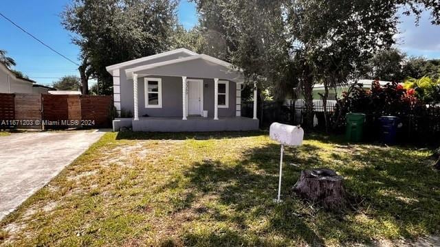 view of front of home with a front yard