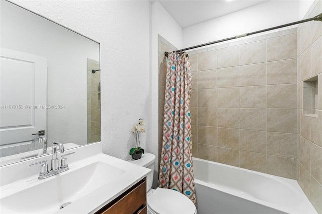 full bathroom featuring vanity, toilet, and shower / bathtub combination with curtain