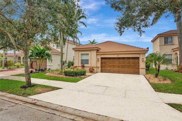 mediterranean / spanish home featuring a garage