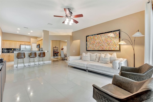 living room with ceiling fan