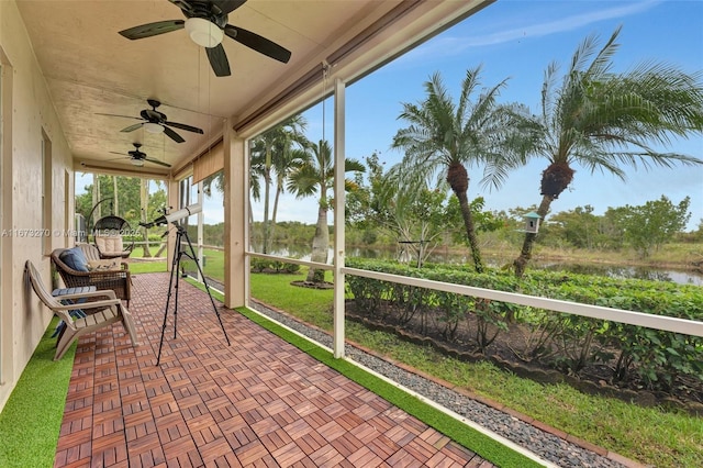 sunroom with a water view