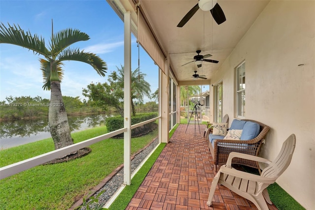 sunroom with a water view