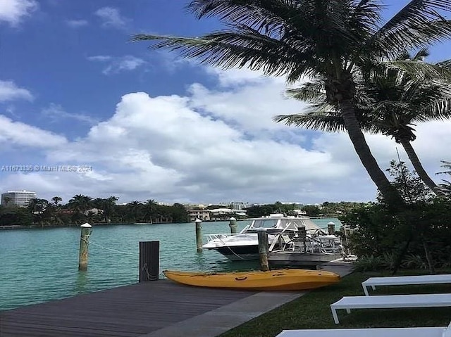 view of dock with a water view