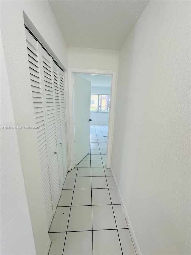 505 NW 177th St Unit 139, Miami Gardens, FL 33169 - hallway featuring light tile patterned flooring