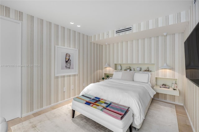 bedroom featuring light hardwood / wood-style flooring