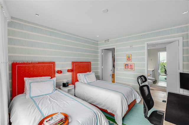 bedroom featuring hardwood / wood-style flooring