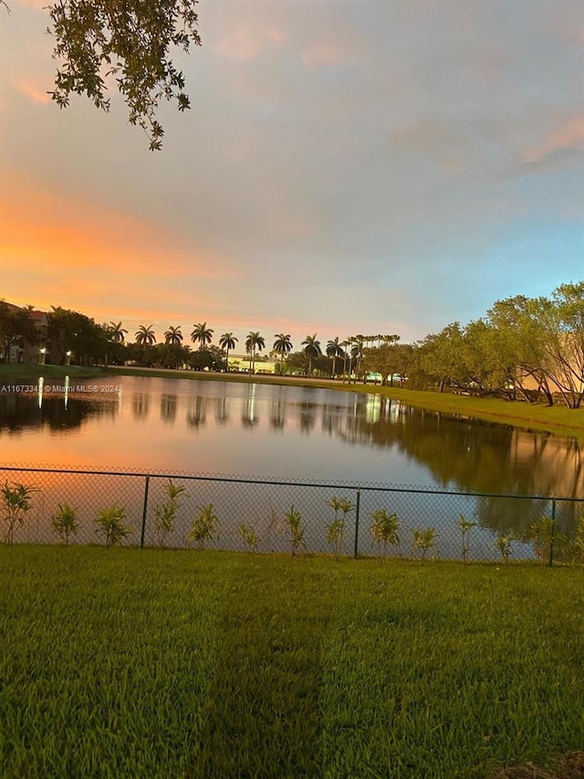 property view of water with fence