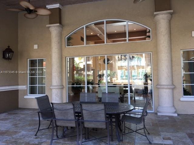 view of patio / terrace featuring ceiling fan