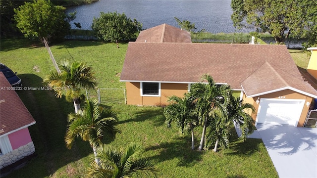 birds eye view of property featuring a water view