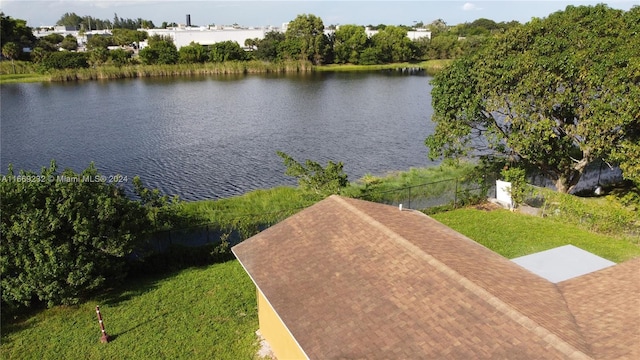 drone / aerial view featuring a water view